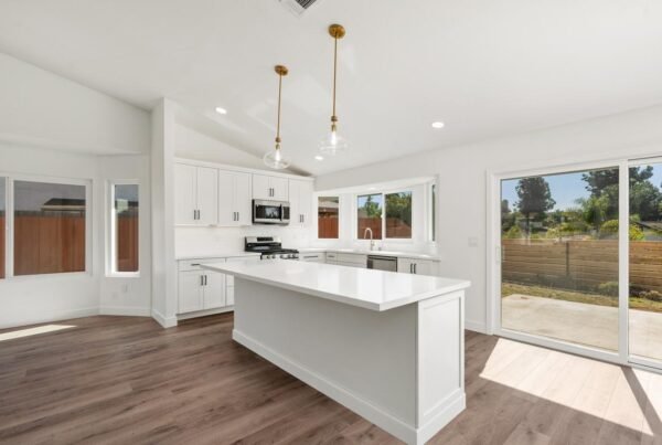 Oceanside home remodel with glass walls